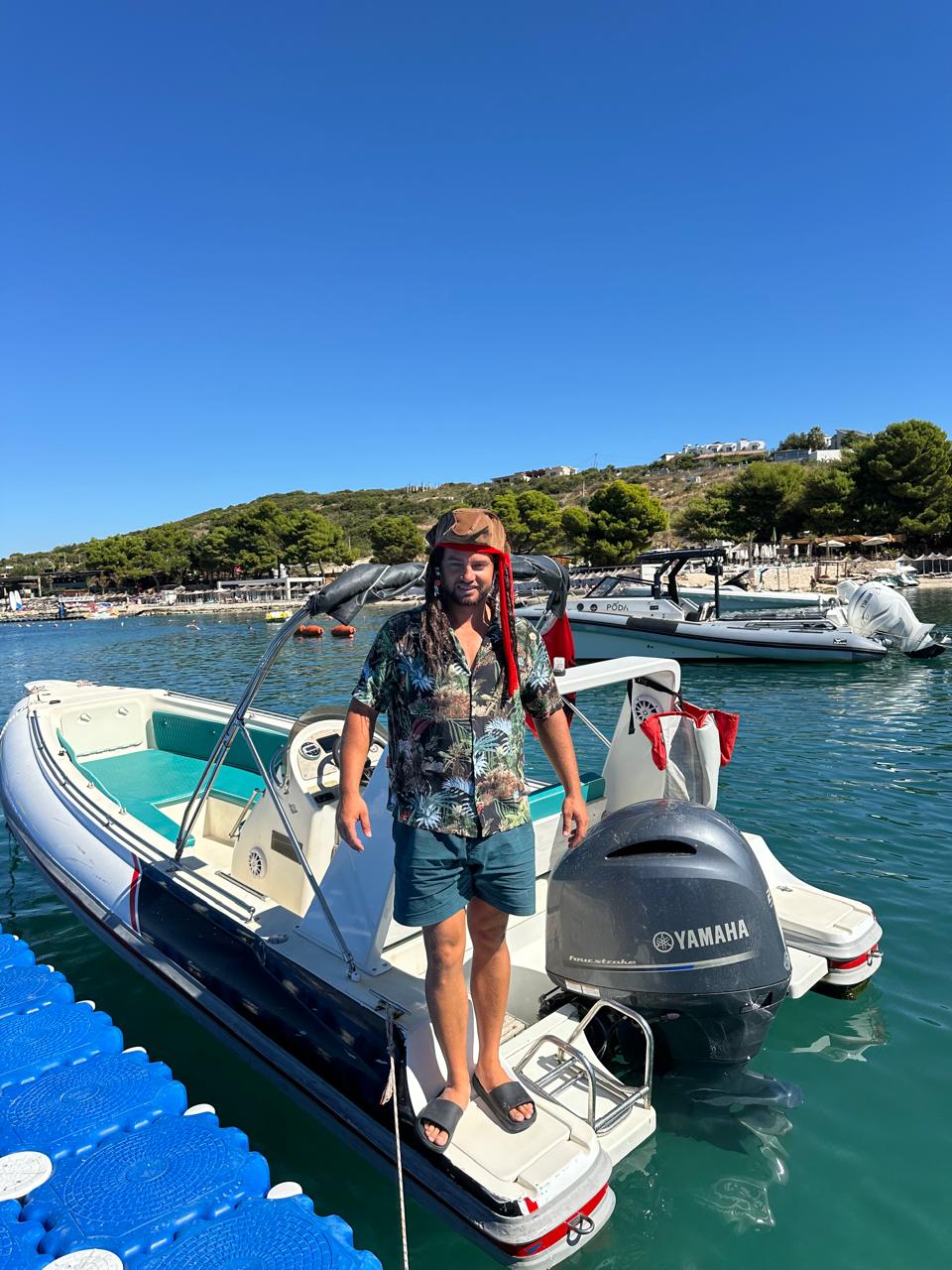 Captain on a Poda speedboat